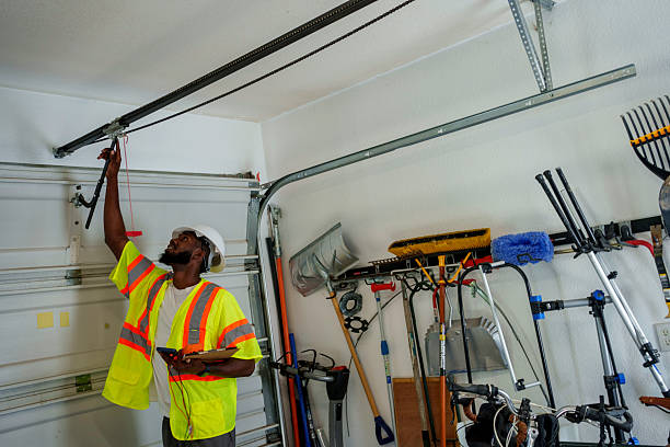 Professional Garage Door Panel Replacement technician working in Greenport West, NY